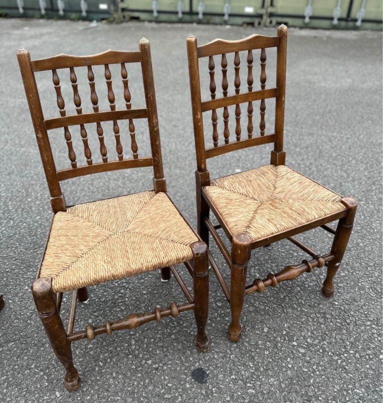 Two antique vintage retro rush seat chairs spindle back