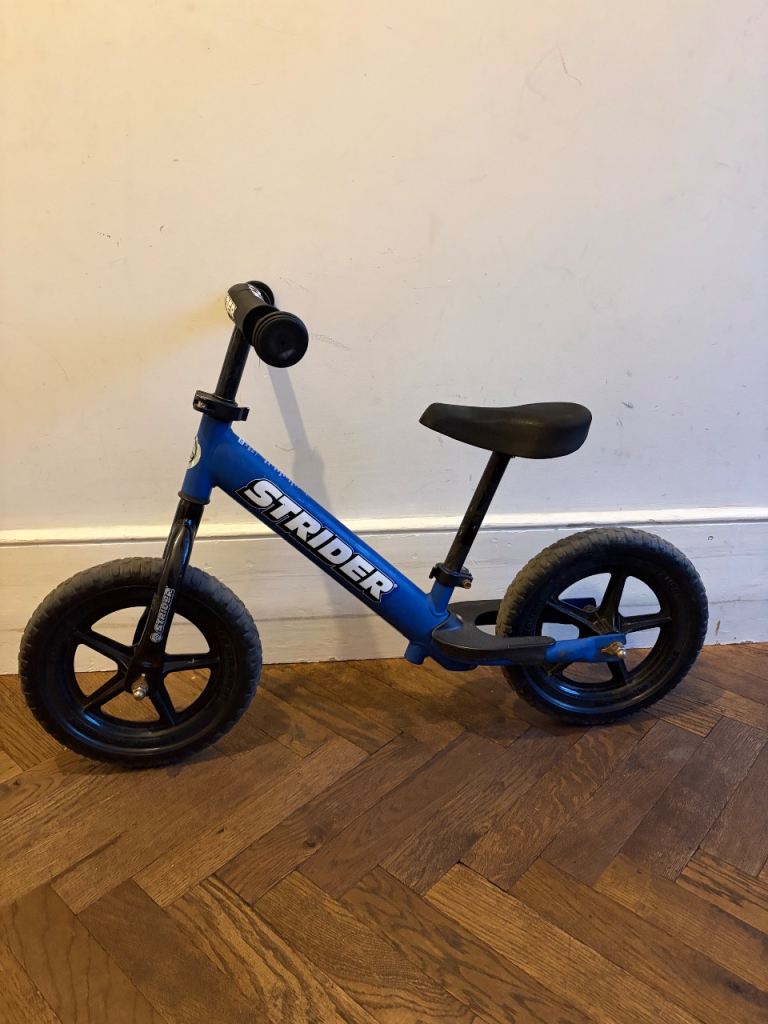 Strider Balance Bike – Blue, Good Condition