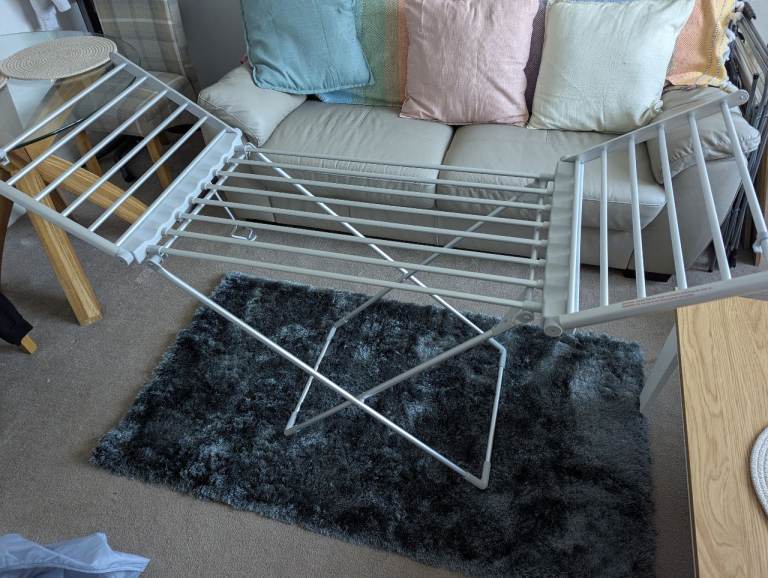 Electric clothes airer with cover