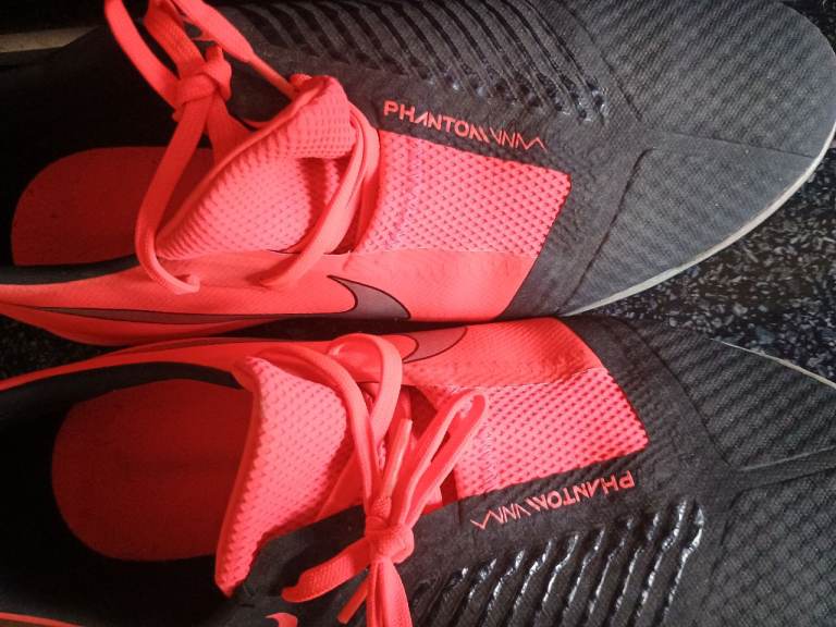 Nike trainers / football boots.