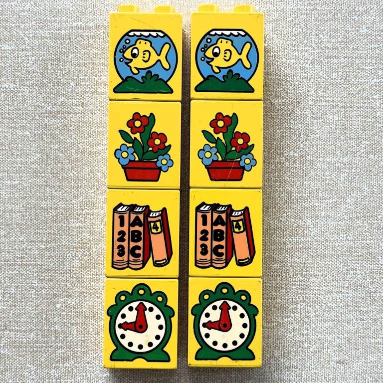 Vintage 1980's 8 x  Lego Duplo picture bricks 2 x 1 stud. 2 ea. fish, flowers, books, clock. £7 ovno