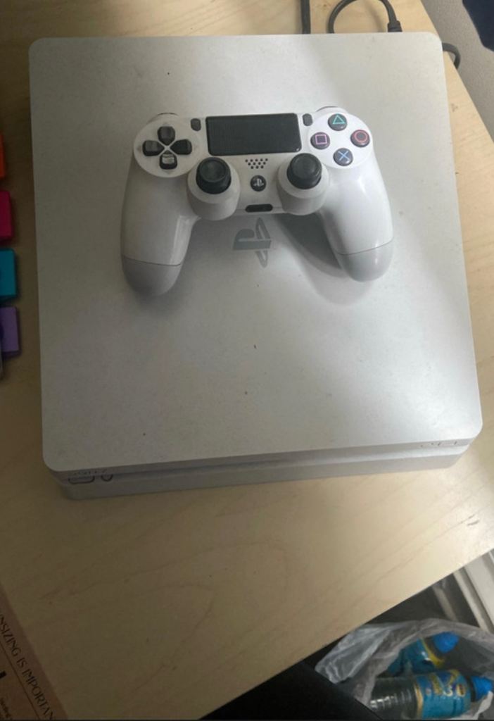 PS4 slim glacier white with 8 games 