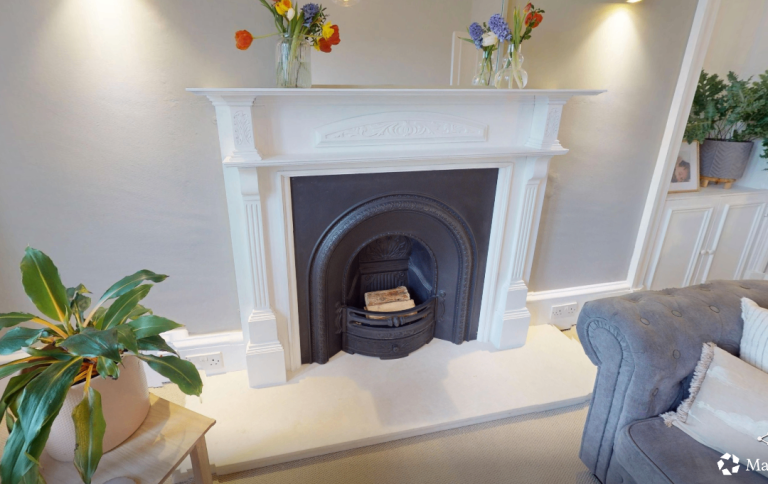 Fireplace - Cast iron inset and wooden surround