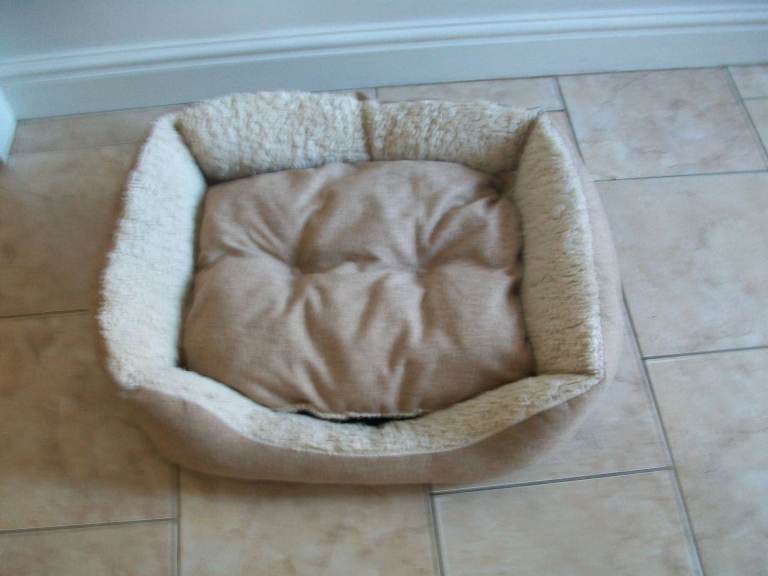 Dog Bed. Length: 28" x Width 22." Inner Measurements: Length: 18" Width 16" 