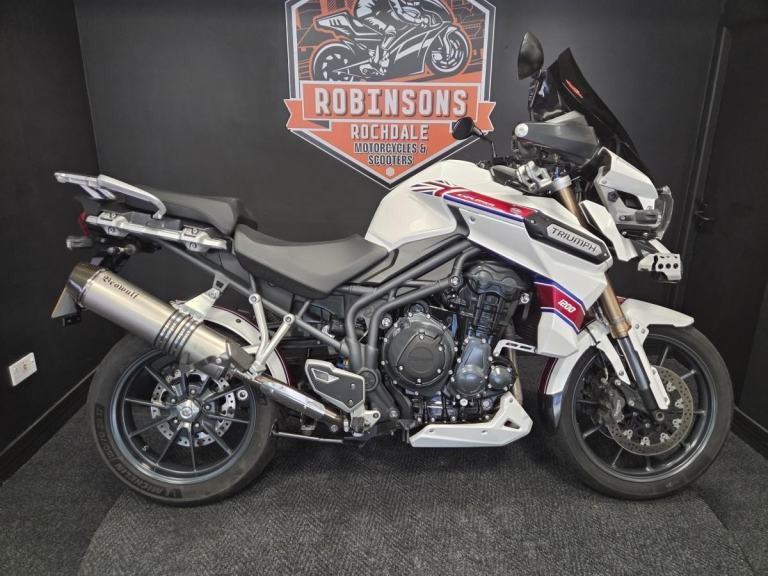 2013 Triumph Tiger Explorer 1215 in white with luggage.