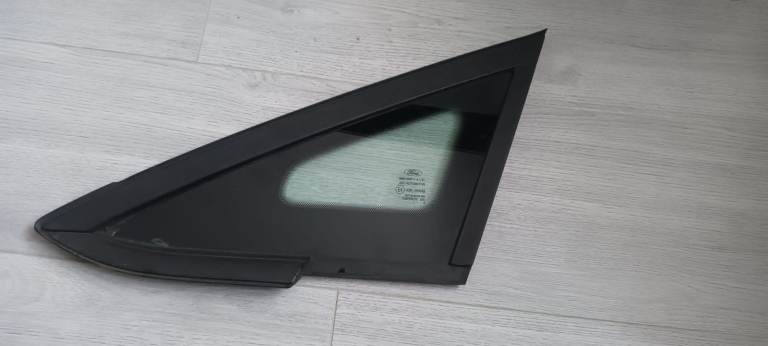 Fiesta 14 last front quarter glass £35