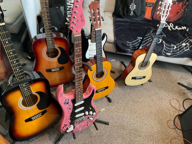 Selection of acoustic and electric guitars prices from £30 up too £80 