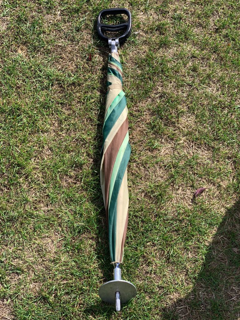 Umbrella gaming/field sports stick seat