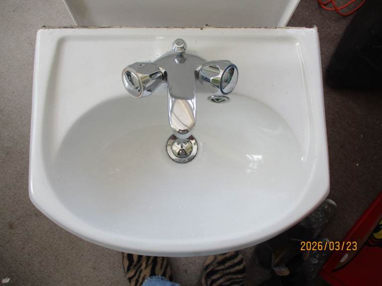 Bathroom sink and tap