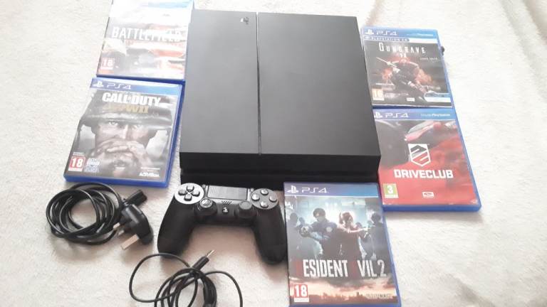Sony PlayStation 4 (PS4) Console with Controller and Games