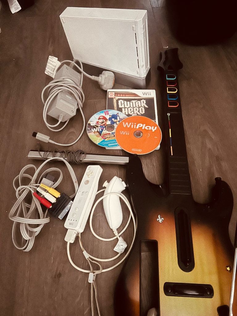 Nintendo Wii Set Up + Guitar hero 