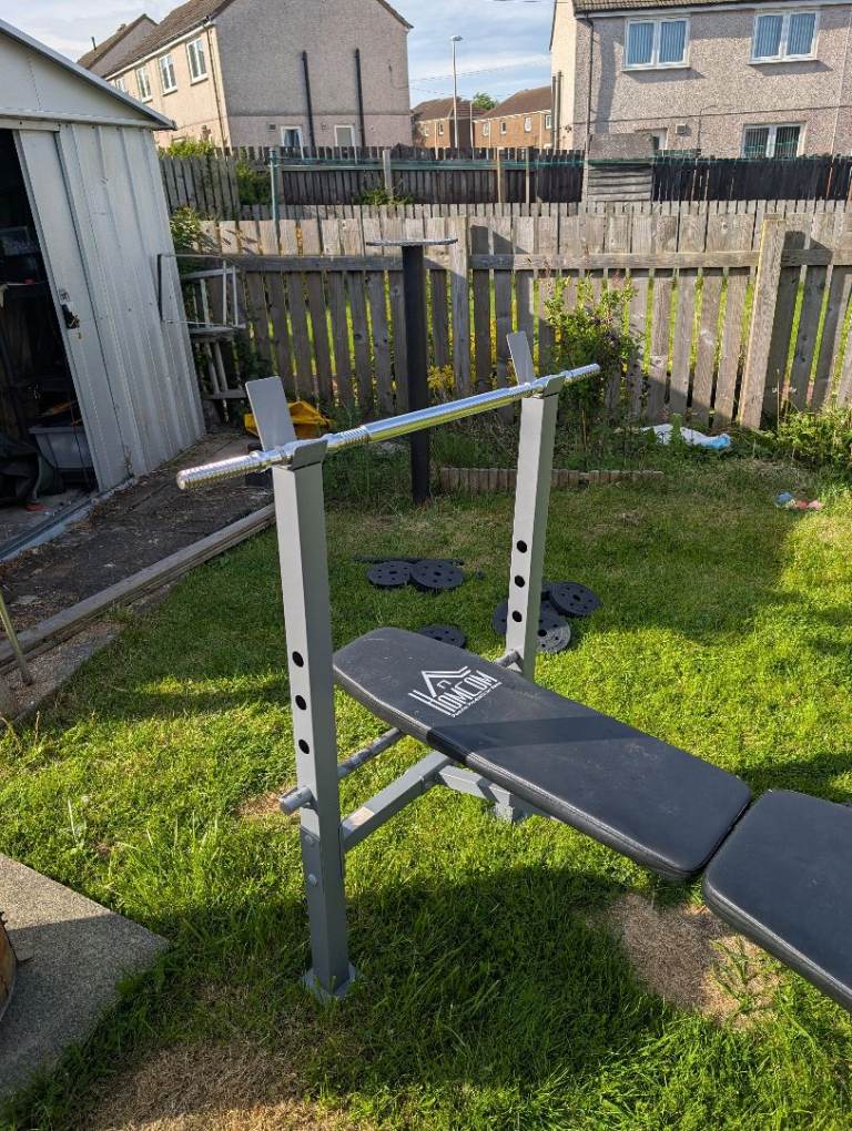 Bench with weights and bar 