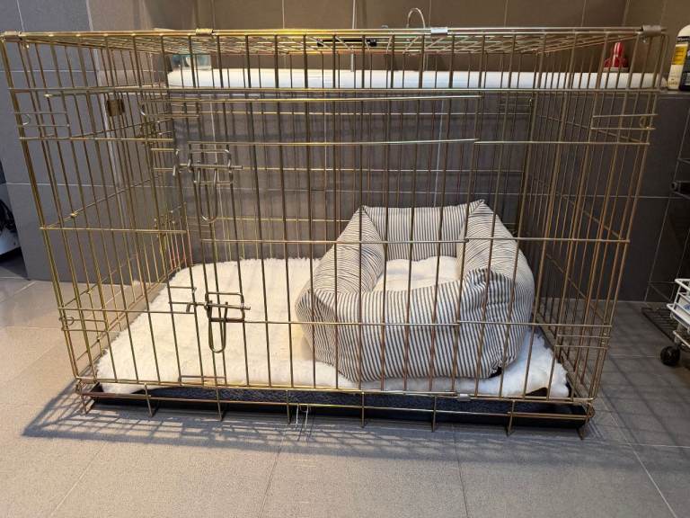 Pet Cage.  Unused. Includes pillow and bedding.  Free to a good home