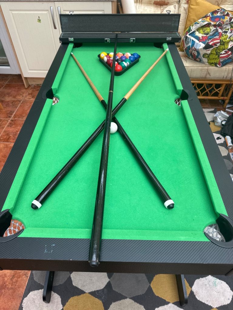 Pool table (Folding) With 3 cues - Good Condition 