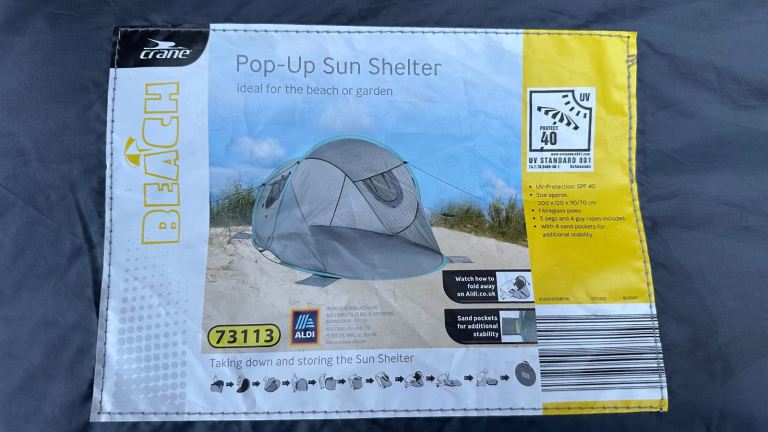 Pop up sun shelter / tent