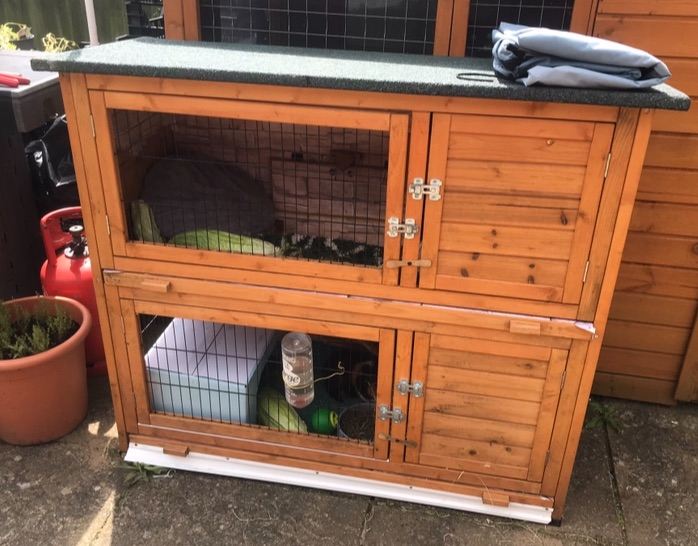 2 x wooden hutches. £150 for both 