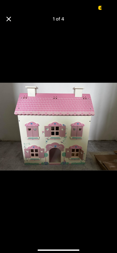 Girl pink dolls house with furnishings 