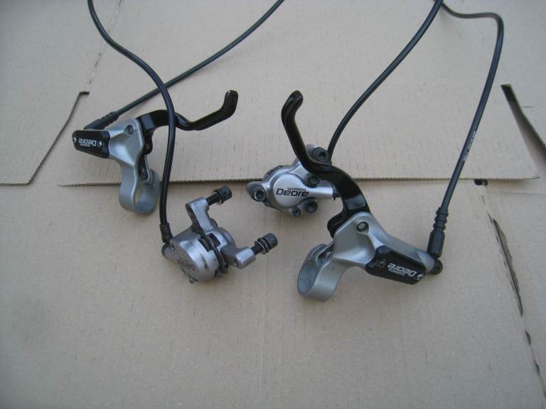 Shimano deore m555 hydraulic disc brakes set retro vintage - Delivery / postage available 