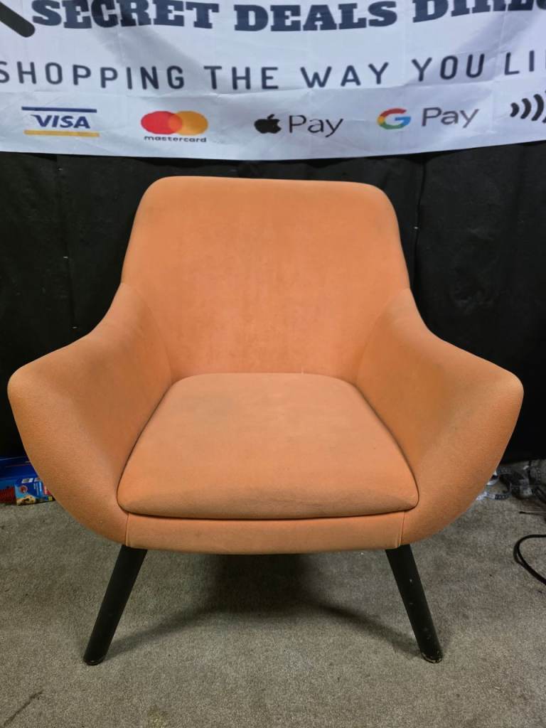 orange chair with retro style wooden legs £30 to clear