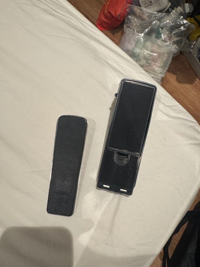 2 door stops (one metal one plastic electric door alarm) 