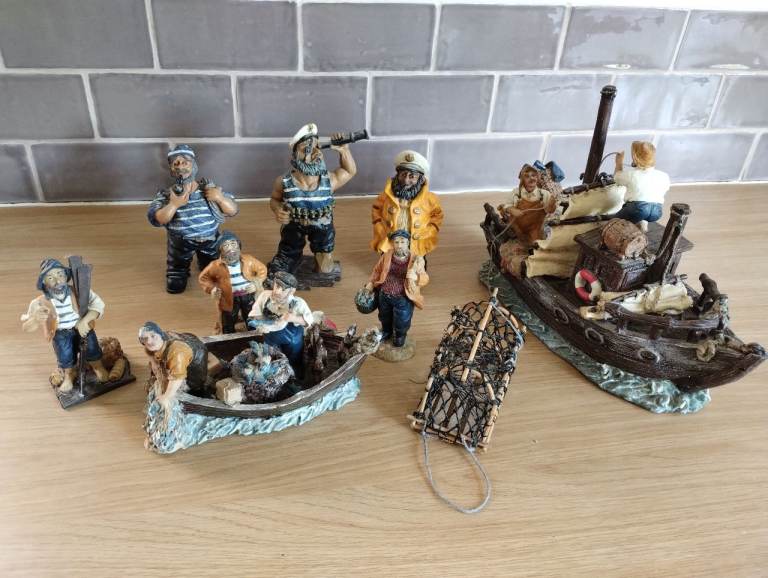 Fishermen & Boats figures ornaments resin. Nine pieces.  used. VGC.