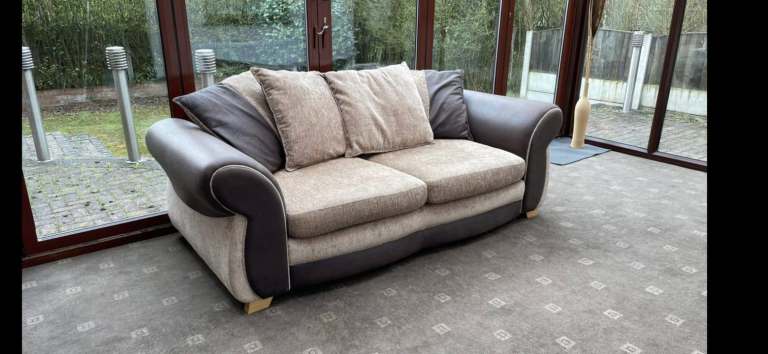 Seater brown suede and fabric sofa. 