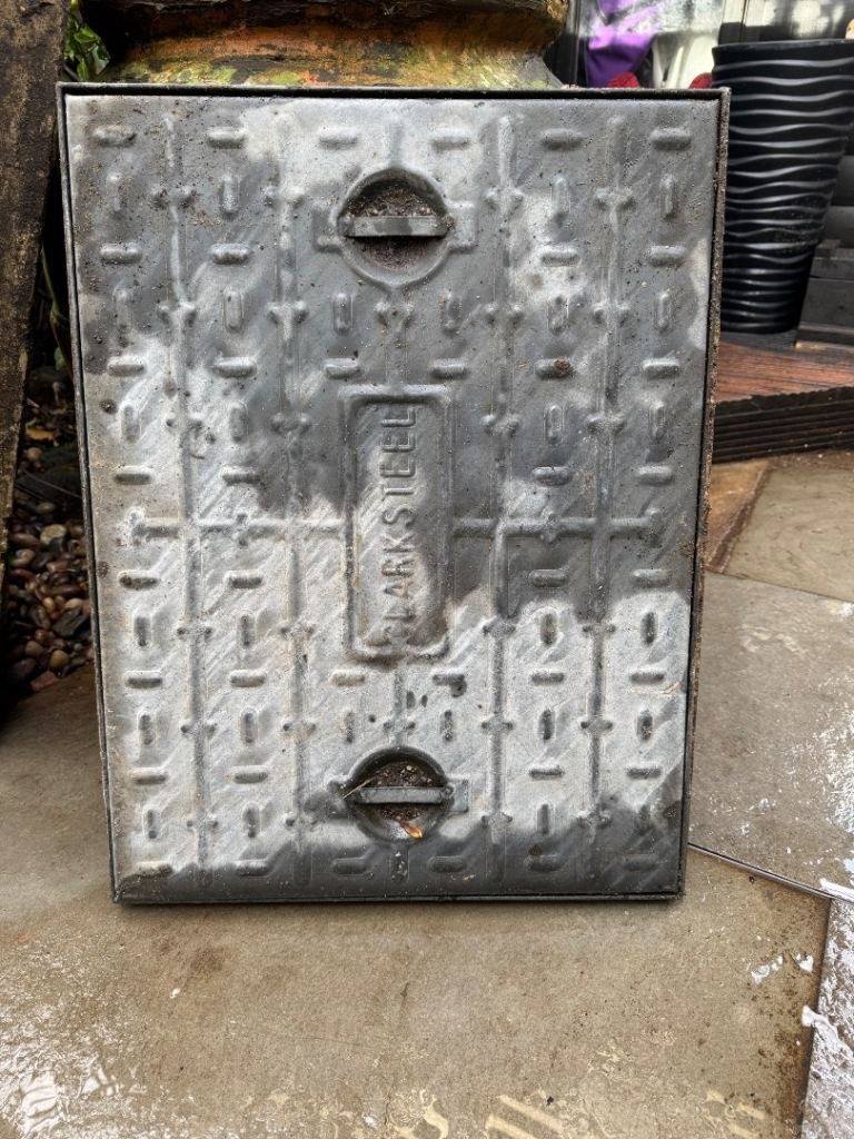 Pressed Steel manhole cover and frame used good condition. 47x 62cm internal measurement.