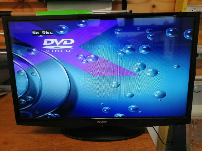 BUSH Flat Screen TV 32 inch with DVD Player. Seldom used. Works 100%