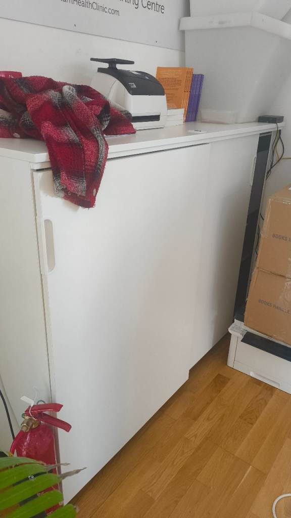 Large white storage unit with code lock