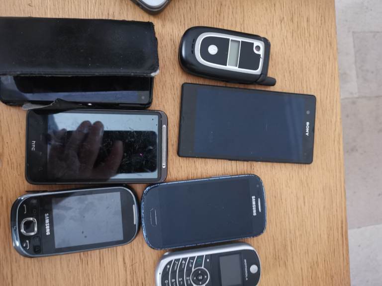 Bundle of Old Mobile Phones and Chargers - Fair Condition