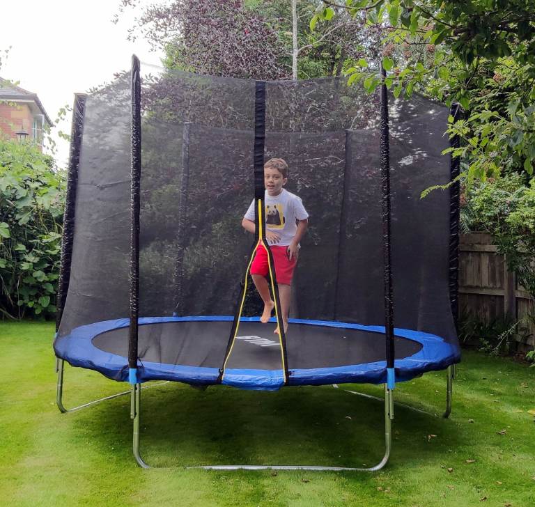 Kids 10 ft Trampoline with Safety Net – As new!