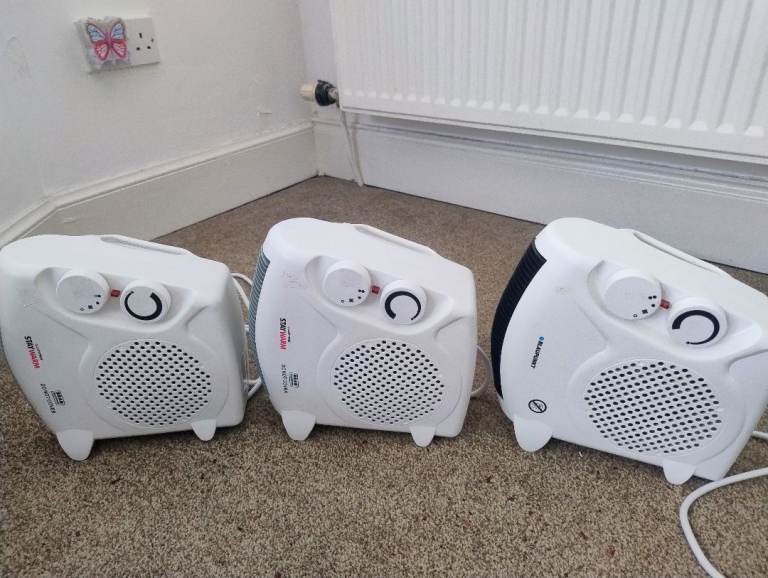 Three White Portable Fan Heaters – Good Condition