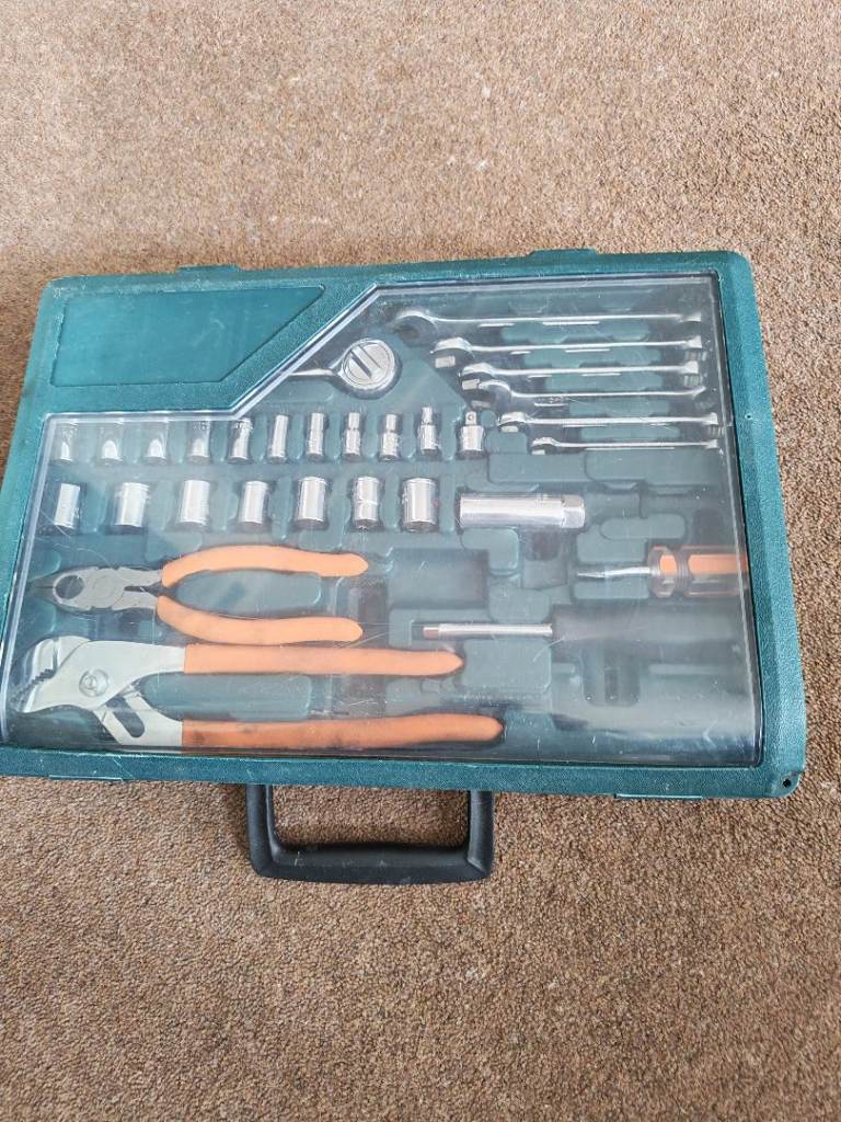Toolkit in plastic storage box.