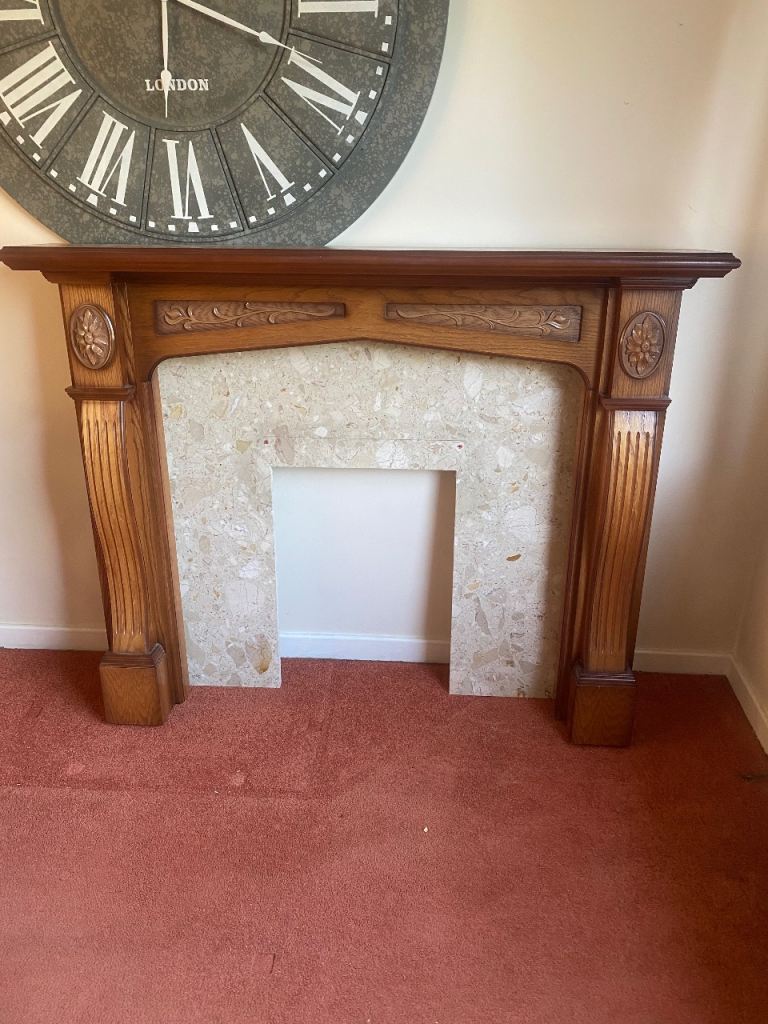 Wooden fire surround and solid marble backing 