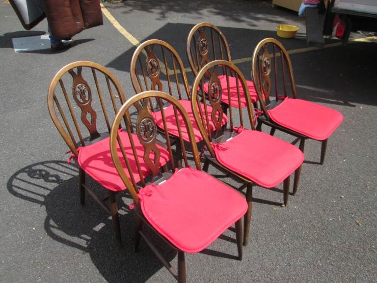 6 ERCOL DARK-OAK WHEEL-BACK DINING CHAIRS (SEE DETAILS BELOW) at HAVEN TRUST CHARITY SHOP
