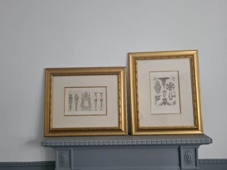 Two prints in gold frames 