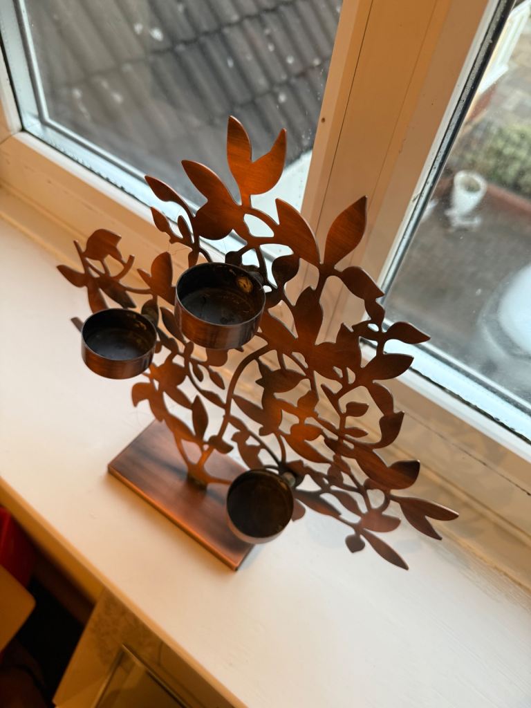 Copper tea light holder