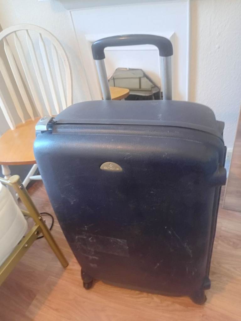 Navy Samsonite suitcase 