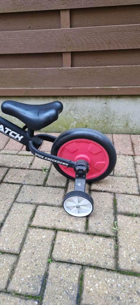 CHILDS BALANCE BIKE WITH REMOVEABLE STABILISERS. EXCELLENT CONDITION.