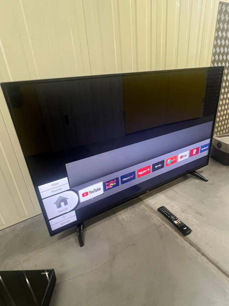 Digihome 55" 4k UHDVSmart TV with Remote Control – Good Condition
