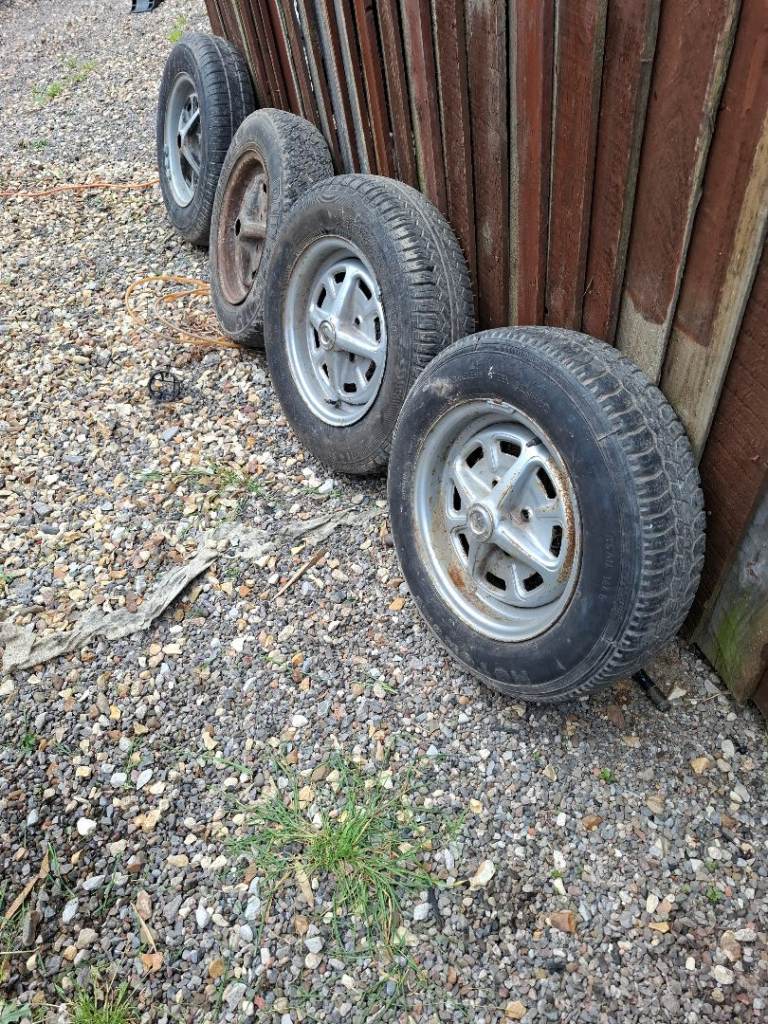 Four second hand roystall mg midjet wheels