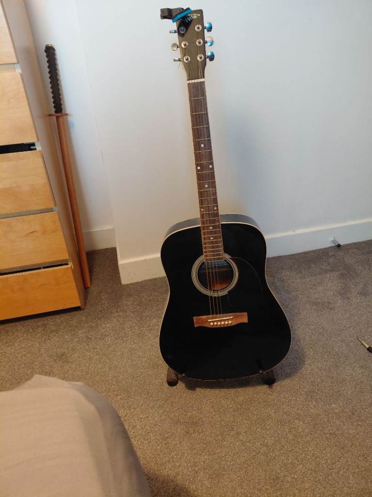 Black Acoustic Guitar with Stand – Good Condition