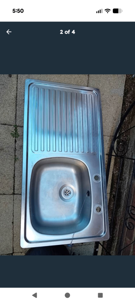 Stainless steel kitchen sink.