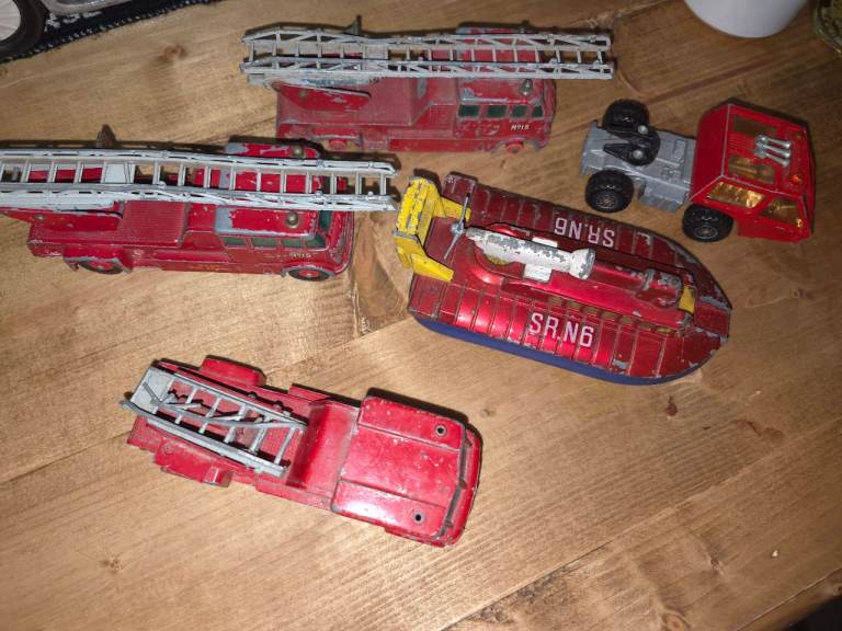 Vintage Red Toy Fire Engines and Hovercraft - Fair Condition