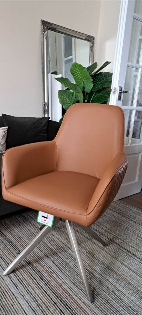 image for 8 Swivel faux leather dining chairs for sale