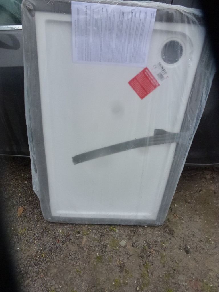 1 x white  shower tray still in wrappings size 1700x800. 90mm outlet