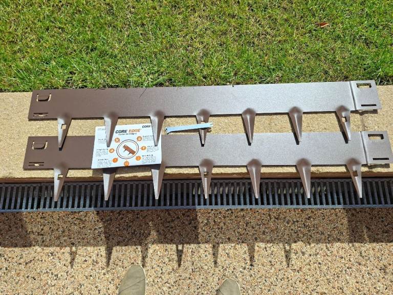 TWO ONE-METRE LENGTHS OF FLEXIBLE STEEL LAWN & PATH EDGING - CORE EDGE LANDSCAPE PRODUCTS