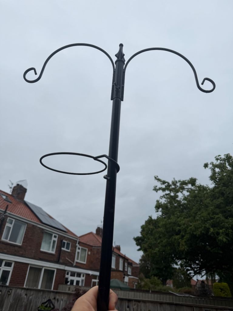 Wrought iron bird feeding station 