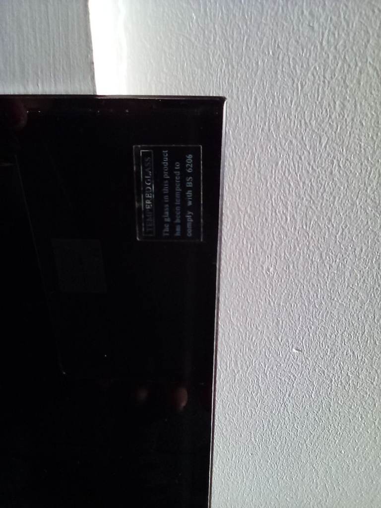 Used compact Black Glass Desk 