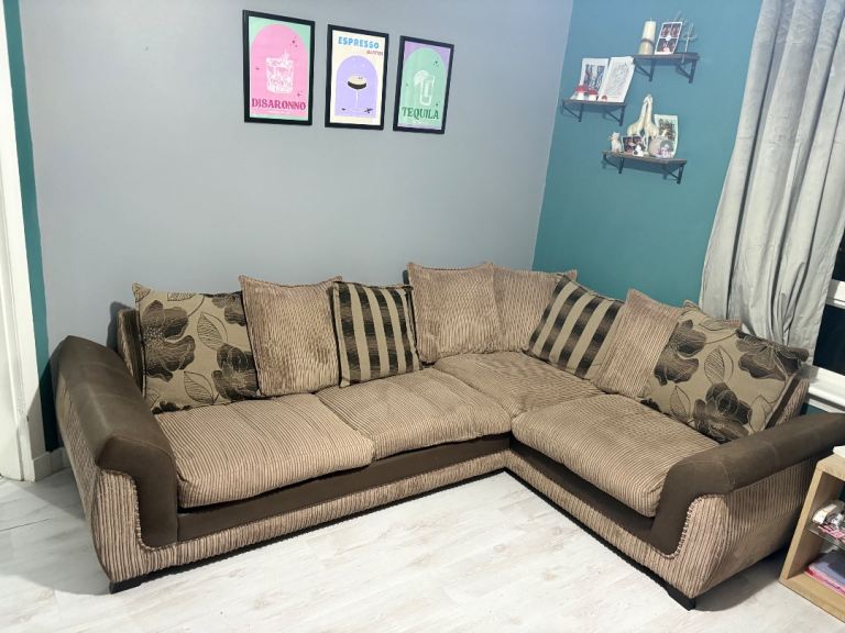 SOLD!! DFS corner sofa with double bed inside and matching pouffe 